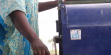 A local Senegalese farmer operates the CTI Thresher, a product design to process millet.